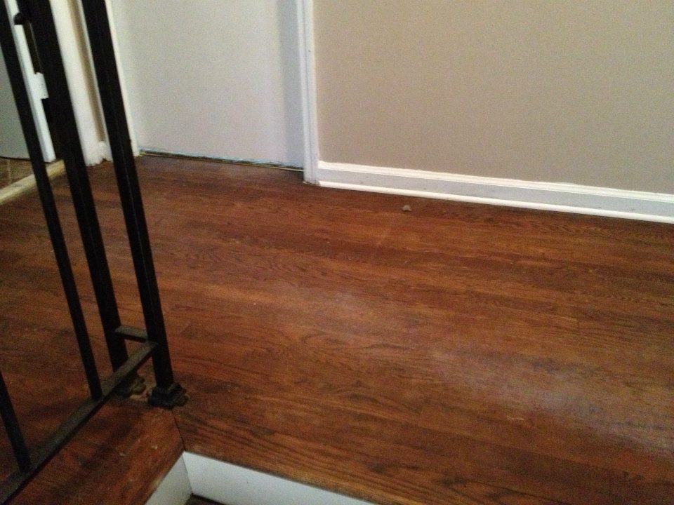 A hardwood floor that needs to be refinished in charleston